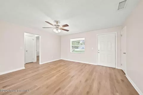 Living - 3386 Jay Tee Dr, Melbourne, FL 32901 photo 2 of 6