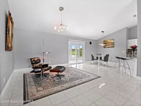 Living - 1320 Ambra Dr, Melbourne, FL 32940 photo 5 of 6
