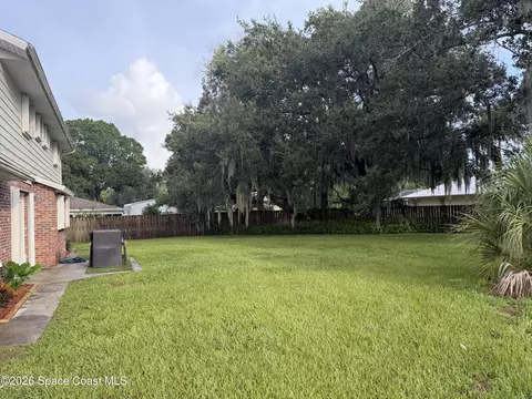 Exterior - 1274 Cimarron Cir NE, Palm Bay, FL 32905 photo 4 of 8