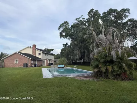 Exterior - 1274 Cimarron Cir NE, Palm Bay, FL 32905 photo 7 of 8