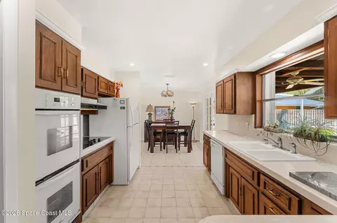 Kitchen - 215 Sand Pine Rd, Indialantic, FL 32903 photo 2 of 5