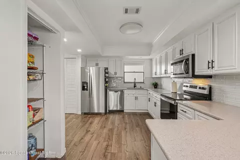 Kitchen - 305 Tangle Run Blvd #1231, Melbourne, FL 32940 photo 4 of 4