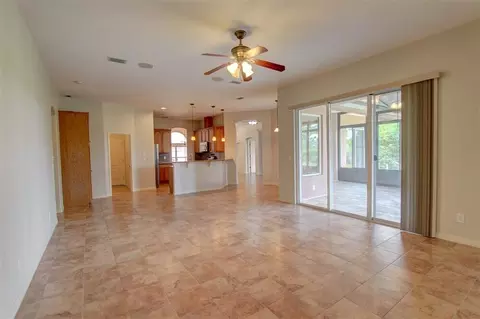 Living - 1185 Dromin Ln, Melbourne, FL 32940 photo 9 of 12