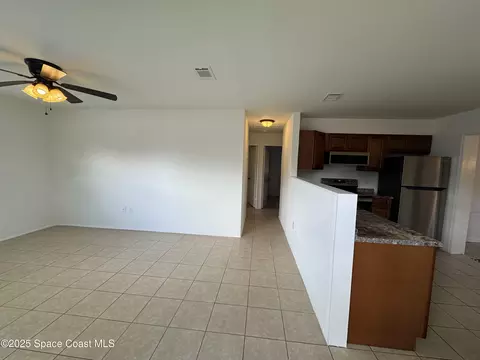 Living - 4396 Thistleberry Dr, Melbourne, FL 32935 photo 1 of 2