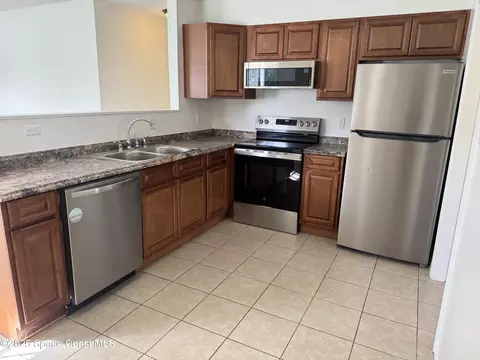 Kitchen - 4396 Thistleberry Dr, Melbourne, FL 32935 photo 1 of 2