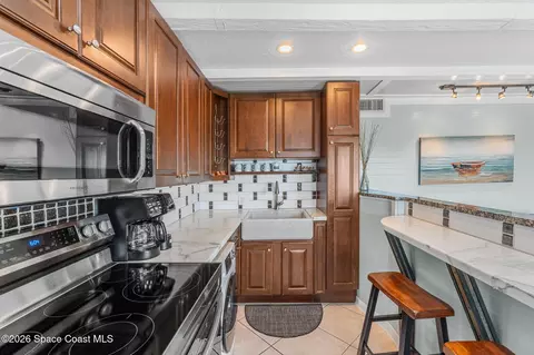 Kitchen - 1209 E New Haven Ave #402, Melbourne, FL 32901 photo 1 of 2