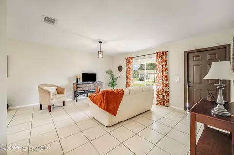Living - 730 Azure Ave NE, Palm Bay, FL 32905 photo 2 of 3