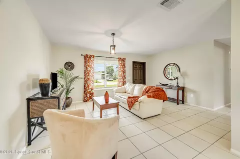 Living - 730 Azure Ave NE, Palm Bay, FL 32905 photo 1 of 3