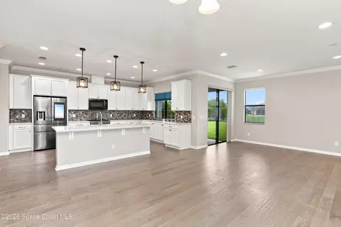 Living - 7735 Millbrook Ave, Melbourne, FL 32940 photo 6 of 6