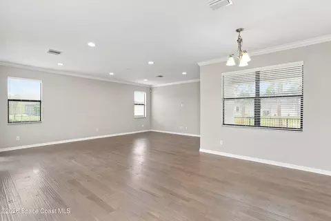 Living - 7735 Millbrook Ave, Melbourne, FL 32940 photo 2 of 6