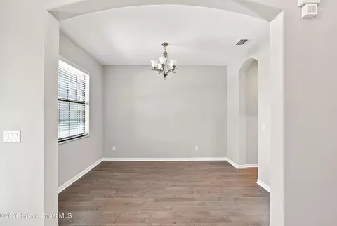 Living - 7735 Millbrook Ave, Melbourne, FL 32940 photo 1 of 6