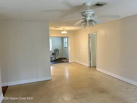 Living - 858 Bianca Dr NE, Palm Bay, FL 32905 photo 2 of 3