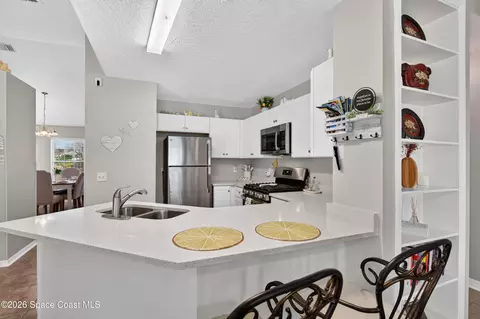 Kitchen - 714 John Carroll Ln, West Melbourne, FL 32904 photo 2 of 3