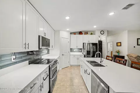 Kitchen - 406 Three Oaks Dr, Edgewater, FL 32141 photo 3 of 5
