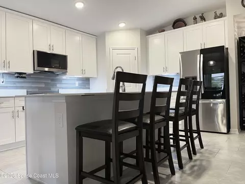 Kitchen - 406 Three Oaks Dr, Edgewater, FL 32141 photo 4 of 5