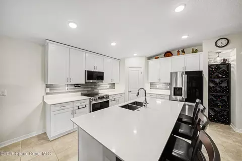 Kitchen - 406 Three Oaks Dr, Edgewater, FL 32141 photo 2 of 5