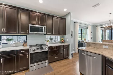 Kitchen - 8552 Strom Park Dr, Melbourne, FL 32940 photo 3 of 4