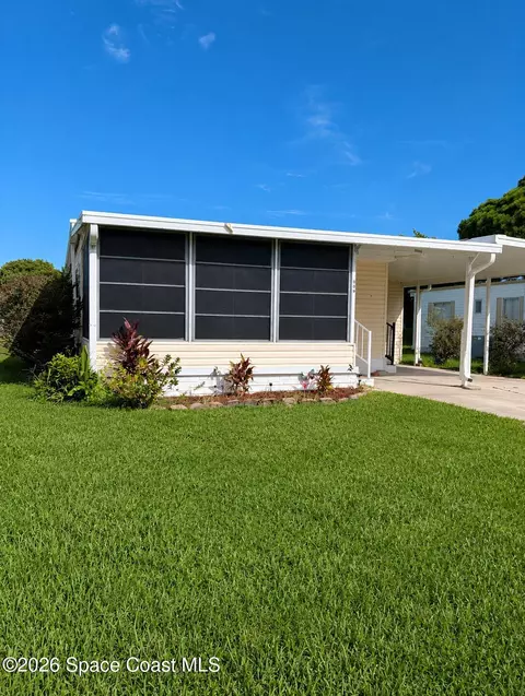 1009 Buttonwood St, Barefoot Bay, FL 32976