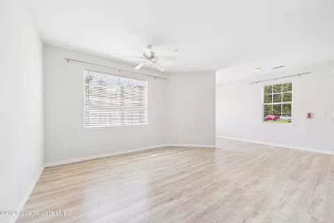 Living - 5683 Star Rush Dr #101, Melbourne, FL 32940 photo 3 of 5