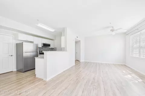Living - 5683 Star Rush Dr #101, Melbourne, FL 32940 photo 2 of 5