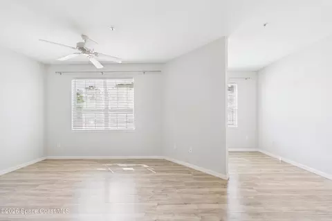 Living - 5683 Star Rush Dr #101, Melbourne, FL 32940 photo 4 of 5