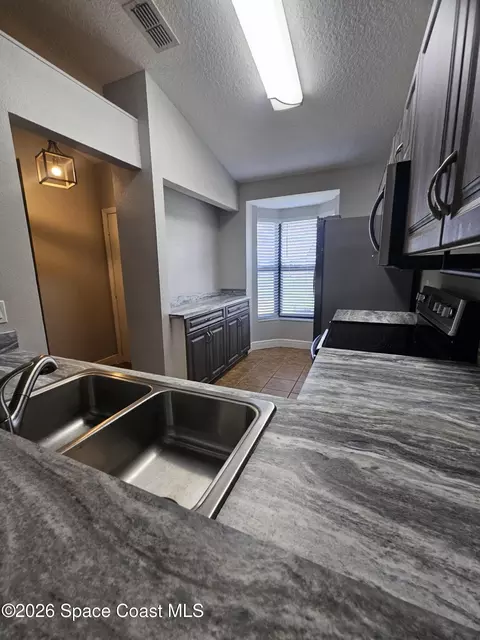 Kitchen - 2510 King Oak Cir, Saint Cloud, FL 34769 photo 5 of 5