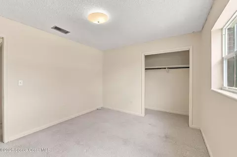 Bedroom - 1861 Dawn Dr, Melbourne, FL 32935 photo 3 of 9