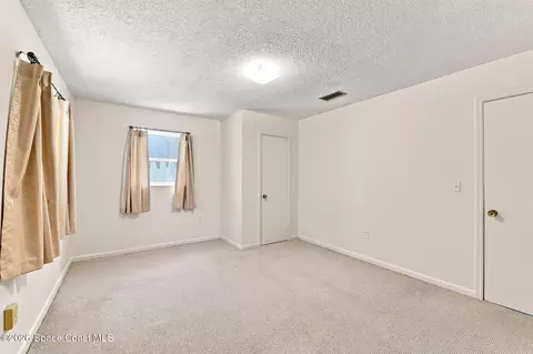 Bedroom - 1861 Dawn Dr, Melbourne, FL 32935 photo 7 of 9