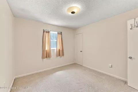 Bedroom - 1861 Dawn Dr, Melbourne, FL 32935 photo 6 of 9