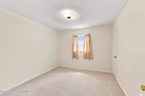 Bedroom - 1861 Dawn Dr, Melbourne, FL 32935 photo 4 of 9