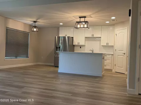 Living - 2306 Sarno Rd, Melbourne, FL 32935 photo 2 of 3
