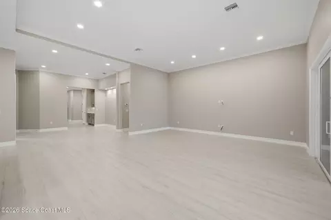 Living - 2502 Edestus Dr, Melbourne, FL 32940 photo 3 of 11