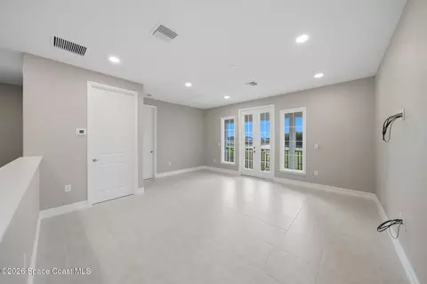 Living - 2502 Edestus Dr, Melbourne, FL 32940 photo 9 of 11