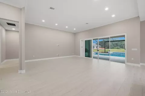 Living - 2502 Edestus Dr, Melbourne, FL 32940 photo 2 of 11
