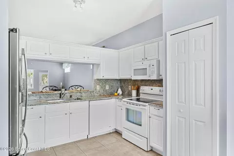 Kitchen - 1065 S Fork Cir, Melbourne, FL 32901 photo 3 of 5