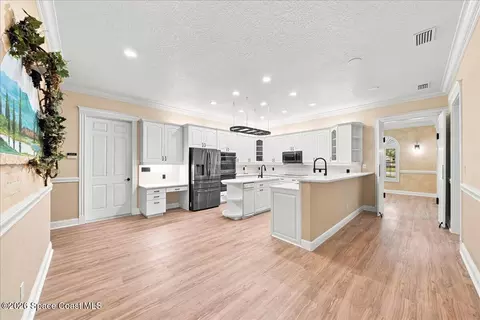 Kitchen - 3565 Sparrow Hawk Trl, Mims, FL 32754 photo 6 of 10
