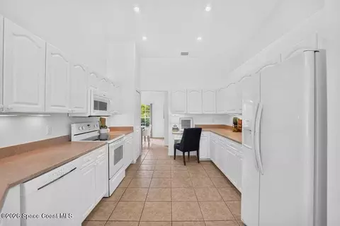 Kitchen - 4630 Sand Point Rd, Grant, FL 32949 photo 8 of 8