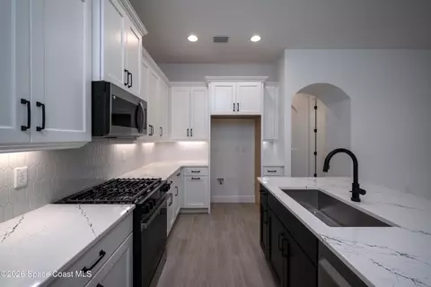 Kitchen - 7689 Allure Dr, Melbourne, FL 32940 photo 2 of 3