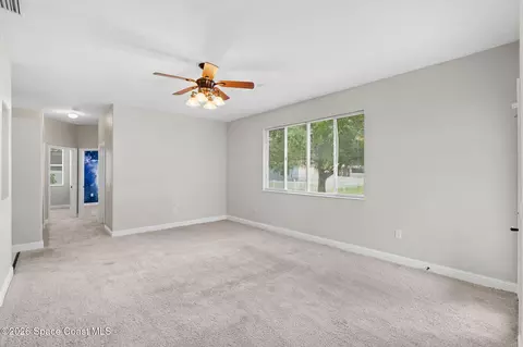 Living - 3211 Merrick Ave, Rockledge, FL 32955 photo 3 of 8