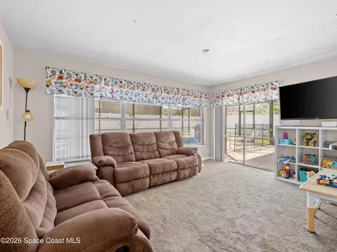 Living - 761 Ixora Dr, Melbourne, FL 32935 photo 2 of 2