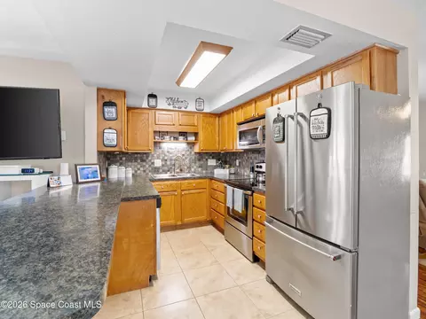 Kitchen - 761 Ixora Dr, Melbourne, FL 32935 photo 2 of 2