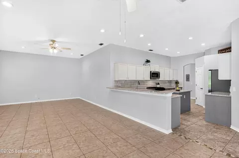 Living - 2410 Summer Brook St, Melbourne, FL 32940 photo 9 of 15