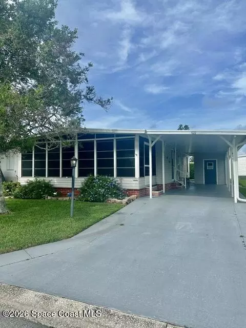 922 Thrush Cir, Barefoot Bay, FL 32976
