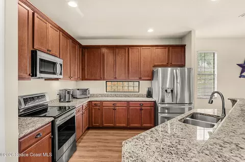 Kitchen - 5895 Trieda Dr, Melbourne, FL 32940 photo 2 of 3