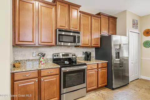 Kitchen - 3674 Sansome Cir, Melbourne, FL 32940 photo 4 of 4