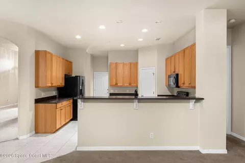 Kitchen - 4459 Chastain Dr, Melbourne, FL 32940 photo 5 of 5