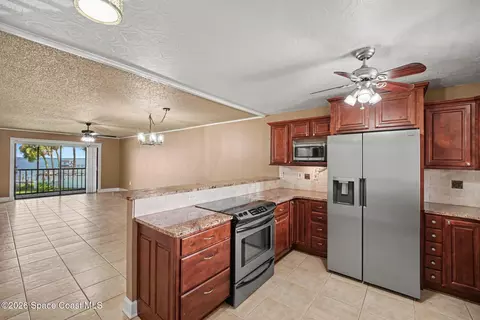 Kitchen - 100 Canebreakers Dr #209, Cocoa, FL 32927 photo 2 of 3