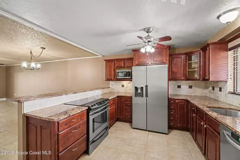 Kitchen - 100 Canebreakers Dr #209, Cocoa, FL 32927 photo 1 of 3