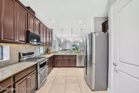 Kitchen - 8044 Creshire Ct, Melbourne, FL 32940 photo 3 of 7
