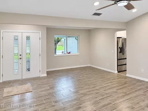 Living - 1240 Coventry Cir, Melbourne, FL 32904 photo 2 of 4